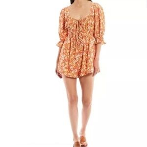 Free People “Show Me Love” Orange Romper size M